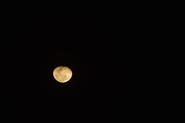 full moon covering by cloud floating on sky in night background