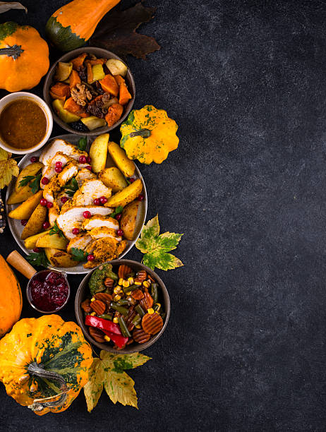 istock Traditional Thanksgiving day dinner with turkey 2251839517