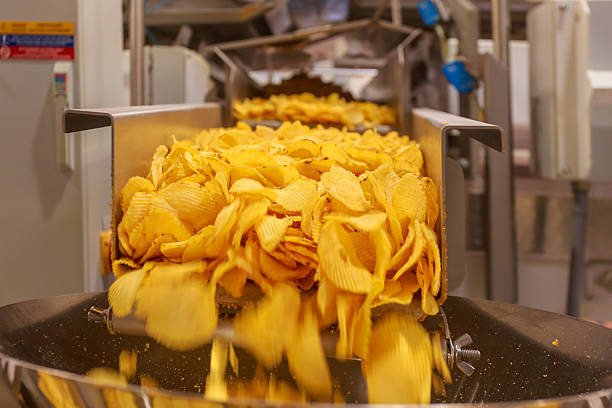 istock Bucket machine for measuring potato chips. 2251839900