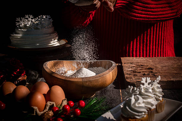 istock Red Sweater Christmas Baking Flour Sifting 2251839958
