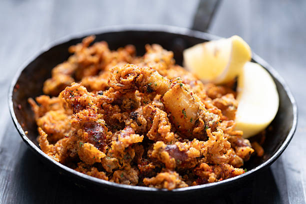 istock pan of crispy fried baby calamari side dish 2251841882