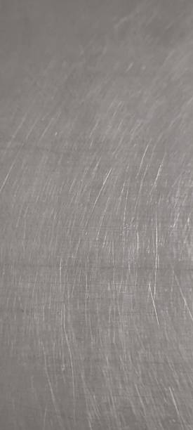 istock Used stainless steel sheet has scratches. 2251846298