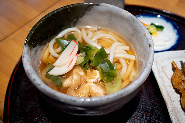 istock Authentic Japanese Udon Noodle Soup with Inari and Fish Cake 2251847004