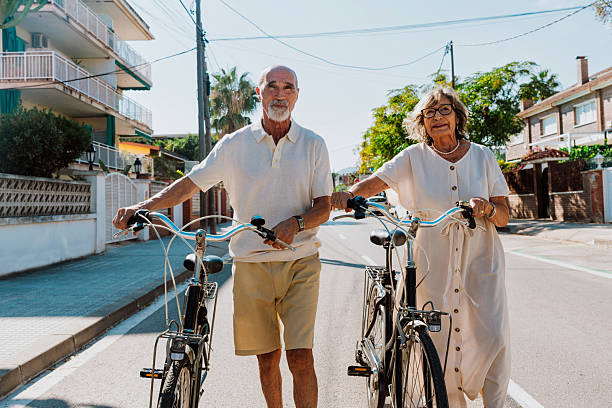 istock Senior couple enjoying active retirement with bicycles 2251847377