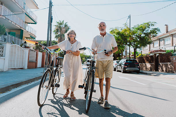 istock Senior couple enjoying cycling activity and active lifestyle 2251847457