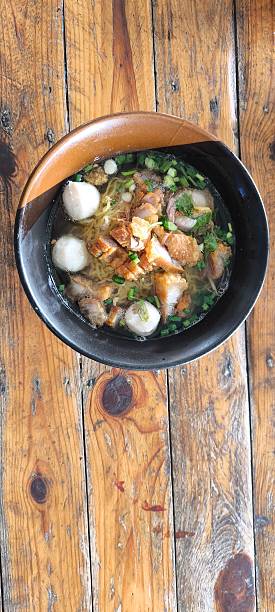 Noodle soup in a bowl is a traditional Chinese dish.