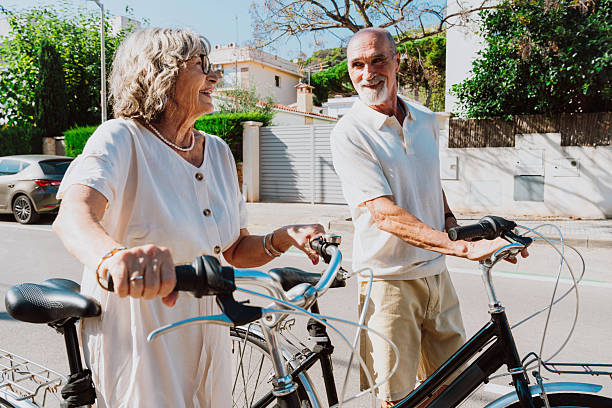 istock Senior couple enjoying active retirement with bicycles 2251848435
