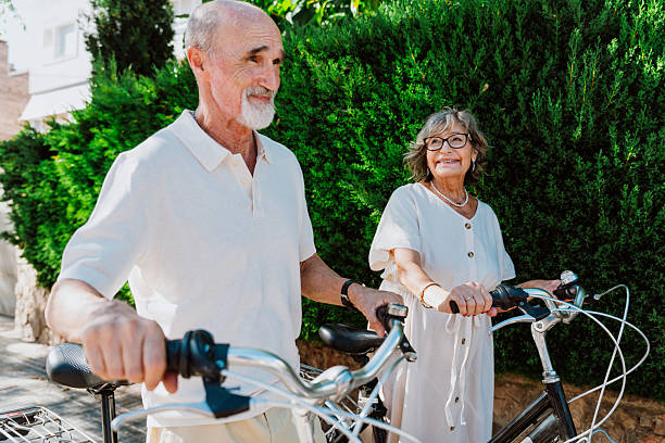 istock Senior couple enjoying active retirement with bicycles 2251848453