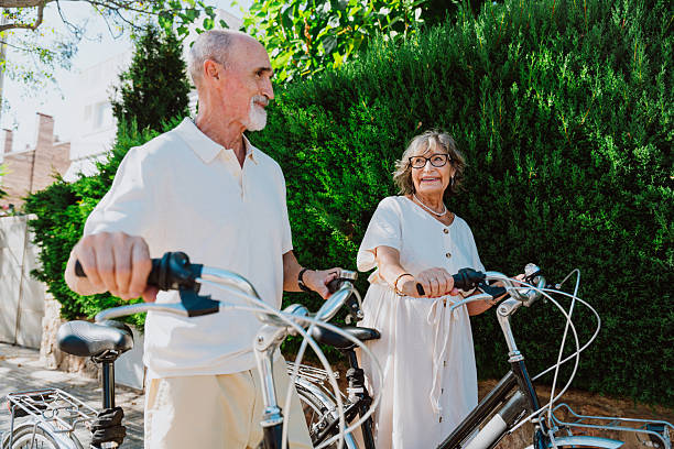 istock Senior couple enjoying active retirement with bicycles 2251848466