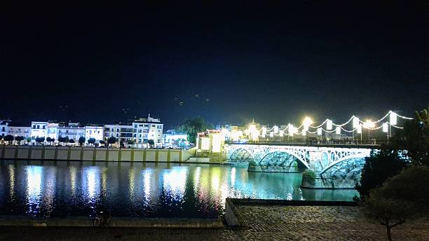 istock Triana Bridge (Puente de Triana) at Guadalquivir River 2251849749