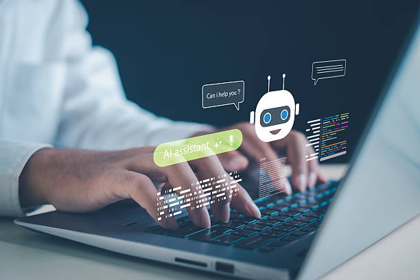 istock person typing on a laptop with AI assistant and chatbot interface graphics, representing modern artificial intelligence, digital technology, machine learning, and virtual support tools. 2251850436