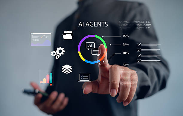 istock AI agents concept showing person interacting with holographic dashboards, data charts, workflow icons, representing automation, intelligent systems, analytics, advanced digital process management. 2251850441
