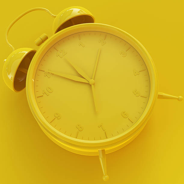 istock Yellow Analog Clock with Yellow Background 2251853878