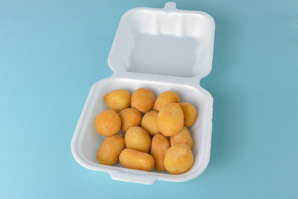 istock Appetizer set - coxinha and cheese balls with bright props 2251859018