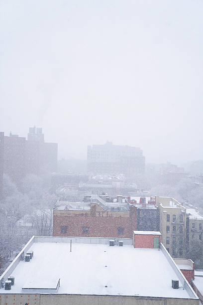 istock a snowy skyline of a city 2251859054