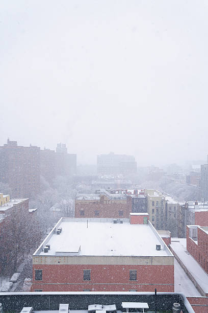 istock a snowy skyline of a city 2251859056