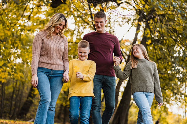 istock Family Having A Walk In Park 2251862930