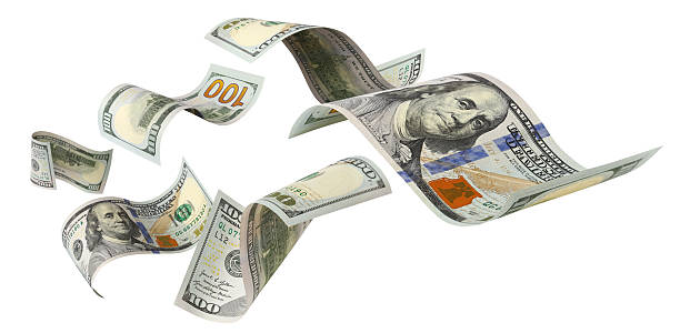 istock Flying hundred dollar bills, isolated on white background 2251863463