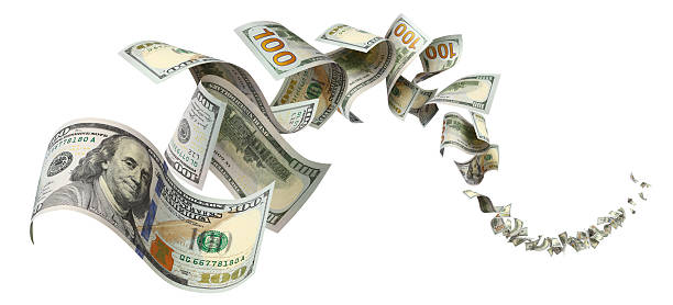 istock Flying hundred dollar bills, isolated on white background 2251863469