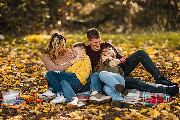 istock Family Plying In Park 2251863488
