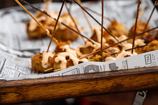 Professional catering with appetizers, fried foods, and drinks, outdoors. Welcome buffet at the wedding reception. Fried foods at a wedding, La Manga del Mar Menor, Murcia, Spain, Europe - November 15, 2025.