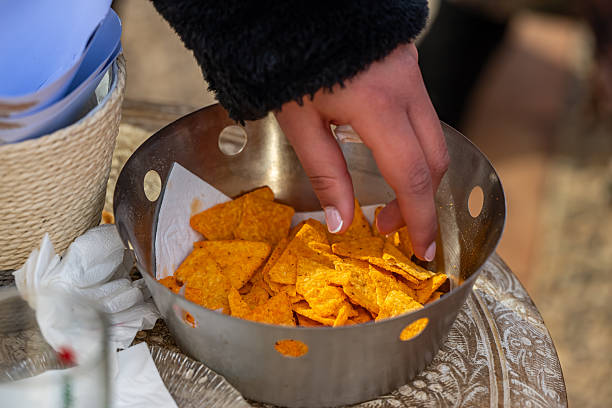 istock Professional catering with appetizers, fried foods, and drinks, outdoors. Welcome buffet at the wedding reception. Fried foods at a wedding. 2251865295