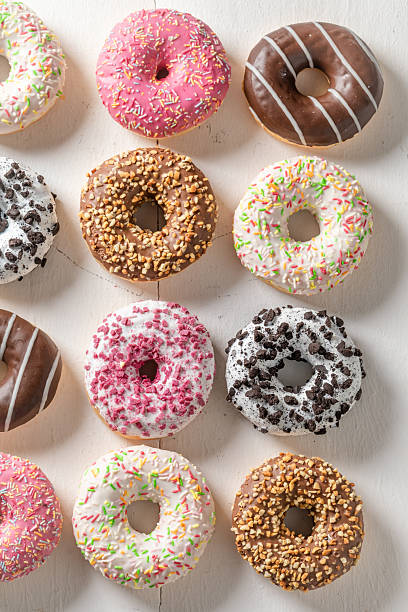 istock Yummy and fresh donuts as takeaway dessert. 2251866090