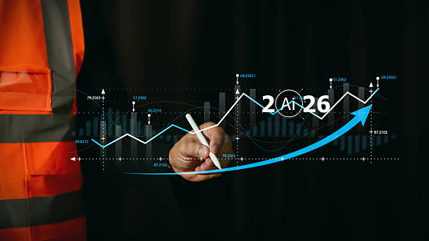 istock Engineer in safety vest analyzing 2026 business growth graphs with AI technology overlay. Future construction industry financial forecast and stock market success concept for corporate investors. 2251867937