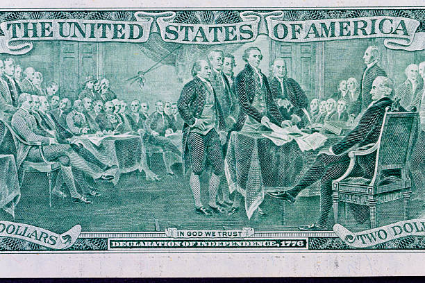 istock Us two dollar bill declaration of independence close-up 2251868124