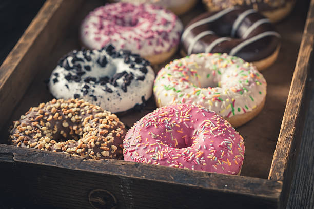 istock Colorful and tasty donuts as popular snack. 2251868600