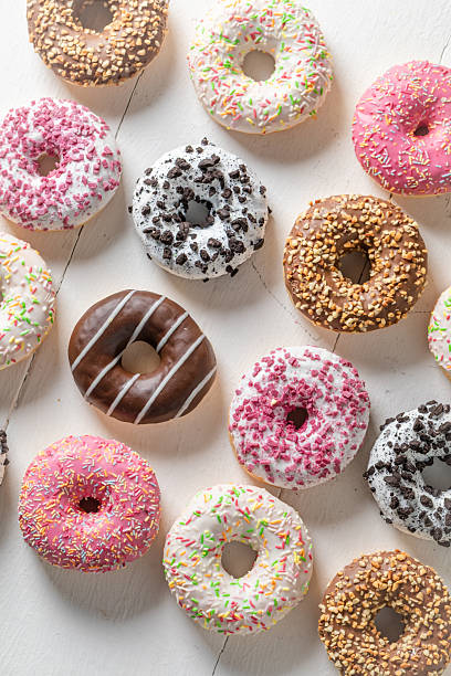 istock Homemade and sweet donuts as takeaway dessert. 2251868734