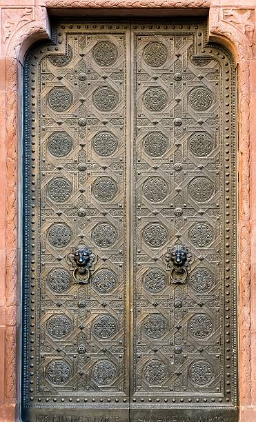 istock Ornate Historic Church Doors with Medieval Metalwork 2251869029