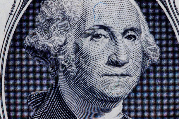 George washington's portrait on a us one dollar bill, showing finance and economy concepts