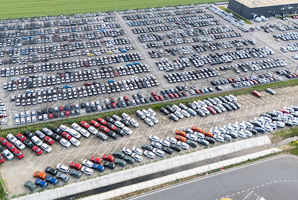 istock Storage facility for new cars 2251875136
