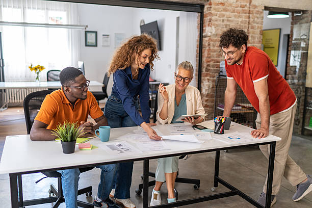 istock Diverse business team collaborating on a project in modern office 2251875459