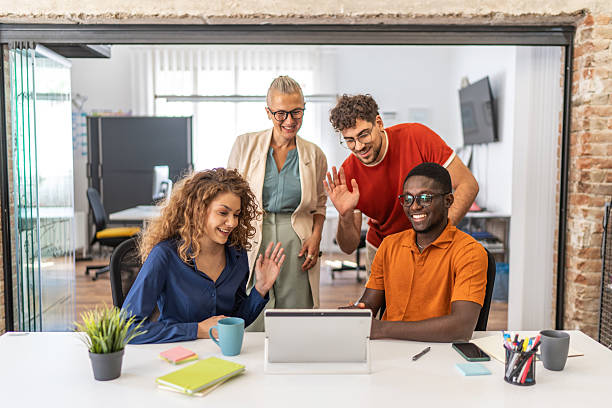 istock Diverse business team having video call in office 2251875676