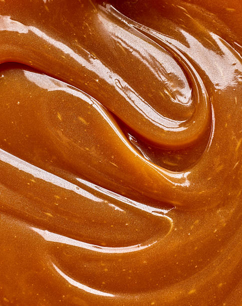 istock freshly cooked caramel sauce background 2251882150