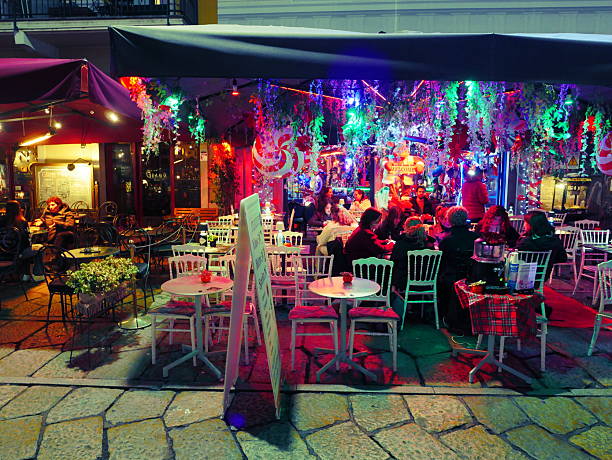 Milan, Italy, Europe - 3 december 2025 - Christmas restaurants on the Naviglio Grande