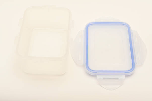 Small containers for food. Two plastic containers with a blue lid for food on a white background.