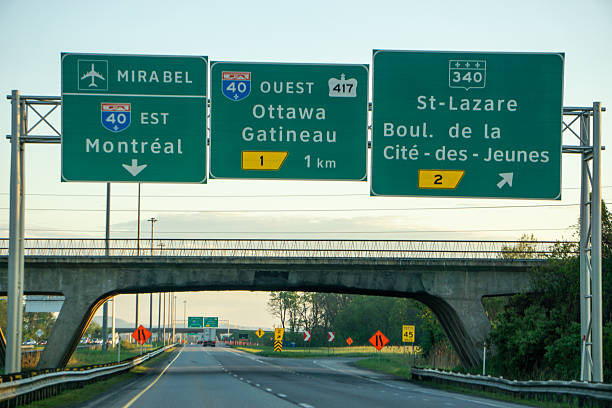 highway signs on the way to montreal canada inside canada