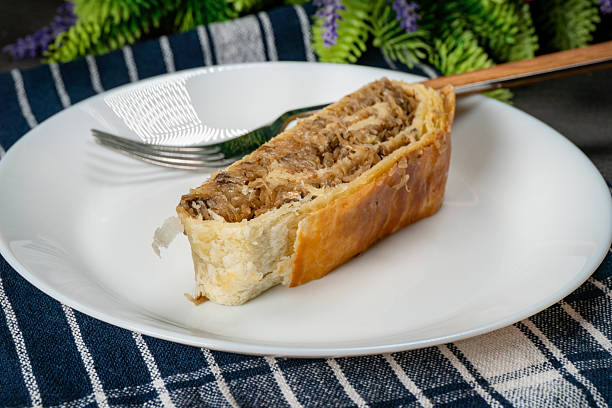 istock Stewed cabbage wrapped in puff pastry. 2251894106