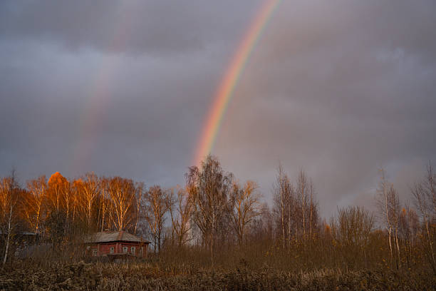 rainbow in the evening sky in autumn, a natural phenomenon