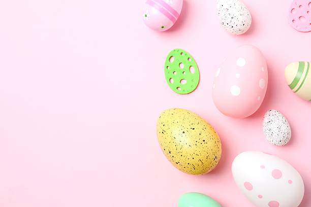 istock Happy Easter. Colorful eggs on color background, space for text or advertising 2251901638
