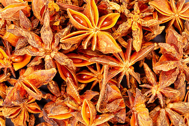 istock Dried star anise spice background texture 2251906977