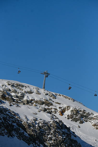 istock Ski lift cablecar on mountain in winter 2251908031
