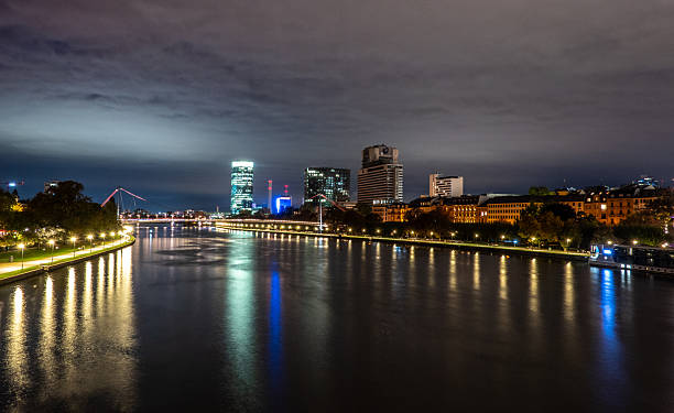 istock Frankfurt skyline in the evening. Sunset at blue hour with illuminated skyscrapers from the financial and business district 2251908134