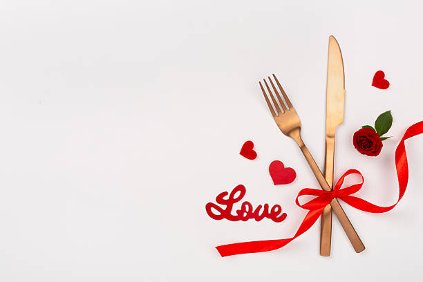 istock Table setting for Valentine's Day on color background, top view 2251909792
