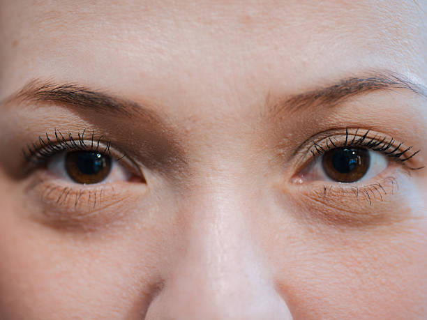 istock Close up of woman eyes looking forward 2251911849