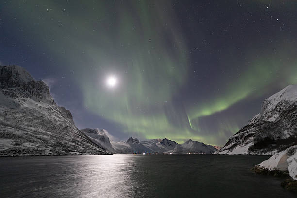istock Aurora Borealis with a visible moon in Mefjordbotn, Norway 2251912131