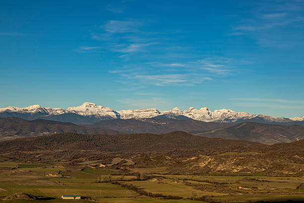 The autumn and dusk view of the Lanuza Reservoir Nature Trail offers beautiful panoramic views of the Peña Foratata Reservoir and Sallent de Gállego. Tena Valley, Huesca Pyrenees, Aragon, Spain